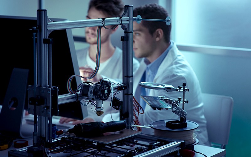 Men in white lab coat in test lab