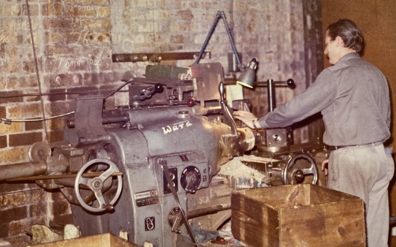 A historical photo showing an RWC machinst